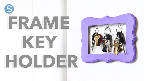Turn an old picture frame into the cutest key holder