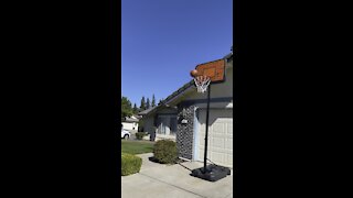 Shooting some hoops out in the driveway