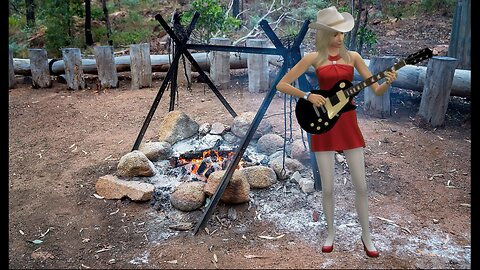 Zsa Zsa plays the guitar and sings a Campfire song, Hiker's Trail Song.