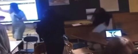 Black Female Student In Flint MI Knocks Teacher Unconscious By Throwing A Chair At Her!