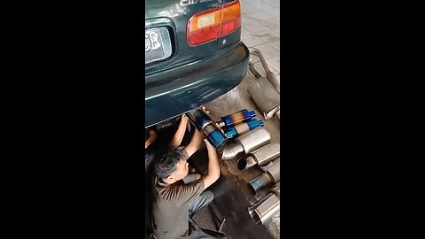 Trying on different mufflers