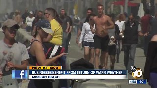 Beach businesses enjoy warm weather