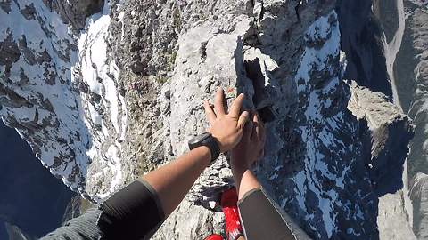 Adventurous Mountain Climber Scales Deadly Knife-Edge Ridge