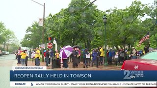 Baltimore County residents take part in reopen rally on Friday in Towson