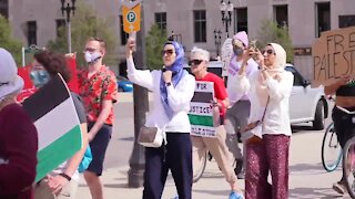 The protesters marched to State Representative Elissa Slotkin's office.