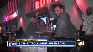 San Diego Police Officers monitor Super Bowl partiers