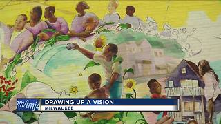 Kids work together to draw huge community mural in Milwaukee