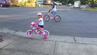 Little Girl Keeps Cycling After Wheels On Her Bike Get Stuck