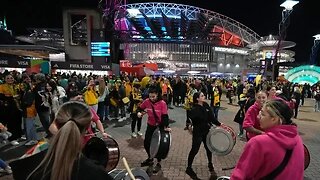 Fans celebrate outside Stadium Australia following World Cup Final