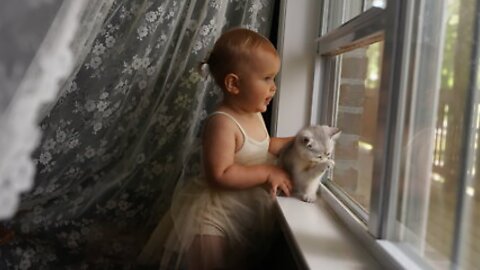 Baby Girl Adorably Kisses Her Cute Little Kitten