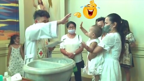 When this child sees that the priest is extending his hand on her, she thinks he wants to play with her so funny