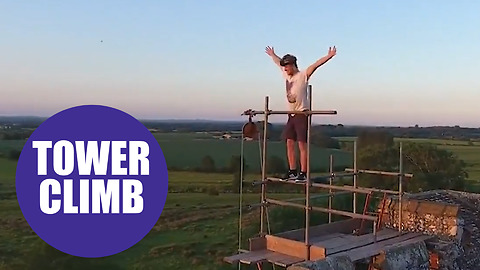Daring climber scaled a 100ft church tower to capture a stunning sunset