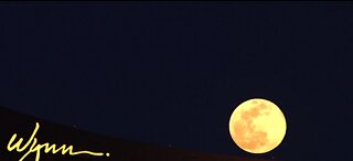 'Super Pink Moon' rises over Las Vegas Strip