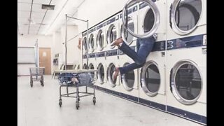 Guy does laundry on the London Underground