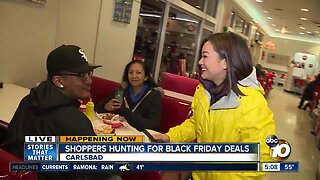 Shoppers grab a bite to eat in the middle of their Black Friday shopping spree