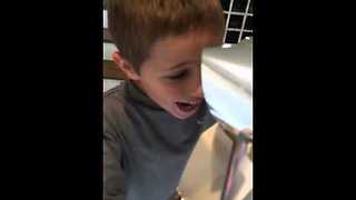 Little boy receives surprise kitten for Christmas