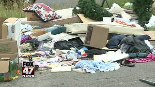 Trash piles up near donation bins