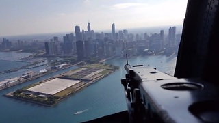 One of a kind WWII aircraft flies across Chicago skyline