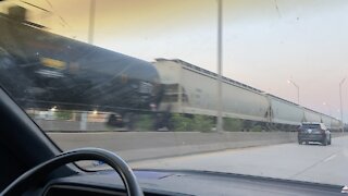 Train on Highway in middle