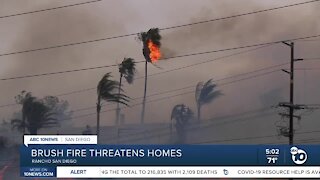 Two brush fires erupt in San Diego County and threaten homes