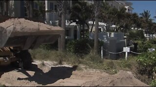 Crews replace dunes eroded by Hurricane Dorian