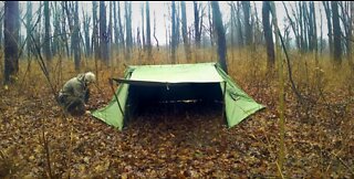 Hot tent camping in the rain