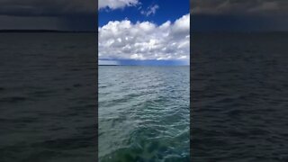 Clouds touch the water