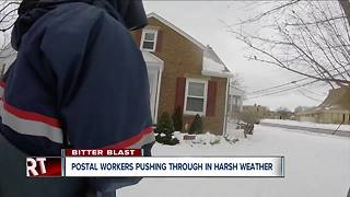 Postal workers battle cold to deliver mail