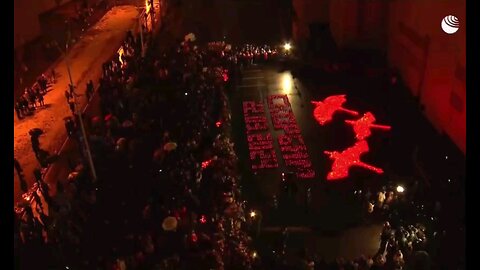 A projection of “The Cranes Are Flying” is being shown on the walls of Crocus City Hall in memory