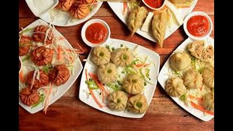 "Steaming Delights: Exploring the World of Momos – Types, Flavors, and Origins"