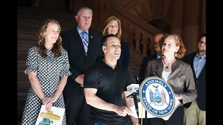 Louis speaks at press conference at New York State capitol