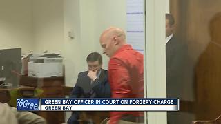 Green Bay Police officer accused of forging ex-wife's signature, selling car