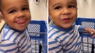 Adorable three-year-old greets strangers at the store