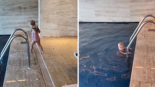 Little Girl Fearlessly Jumps Into The Pool
