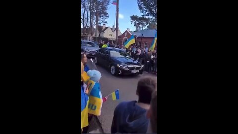 crowd in Dublin surrounds the vehicle of the Russian ambassador