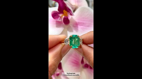 Jeweler Custom hand crafting a oval & emerald cut diamond emerald engagement anniversary ring