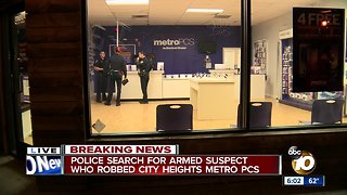 Police searching for armed suspect who robbed City Heights cellphone store