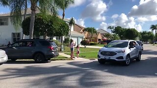 Crystal Lakes Elementary School teachers parade through neighborhoods