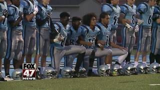 Lansing high school says athletes can't play if they kneel during the National Anthem