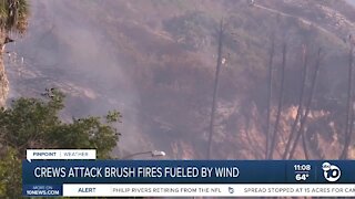 Crews attack brush fires