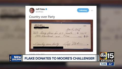 Arizona Senator Jeff Flake sends check in support to Roy Moore's opponent