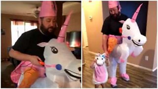 Father and daughter dress up as unicorns for Halloween