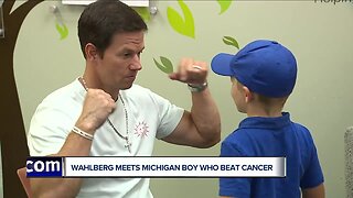Mark Wahlberg meets with boy who beat cancer before opening Royal Oak Wahlburgers
