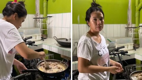 Woman gets hilariously pranked while she's cooking