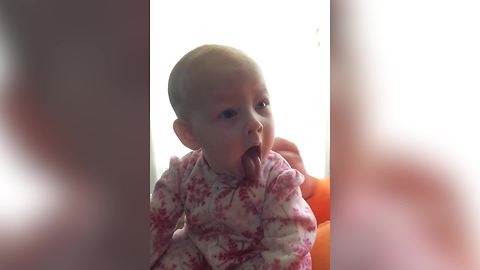 Cute Baby Girl Keeps Sticking Her Tounge Out