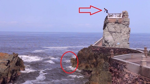 Fearless daredevil performs insane cliff jump