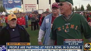 Fiesta Bowl fans celebrating NYE in Glendale