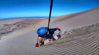 Sandboarding fun in Chile's dunes