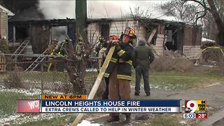 Firefighters battle Lincoln Heights house fire in snowy conditions