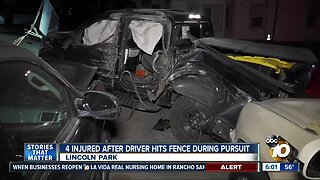 4 hurt after truck in pursuit hits fence